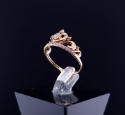 Gold ring with zircons