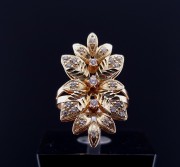 Gold ring with zircons