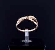 Gold ring with zircons