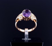 Vintage gold ring with colored stone