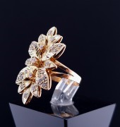 Gold ring with zircons