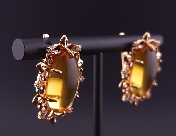 Gold earrings with citrines and fianites