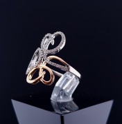 Gold ring with zircons