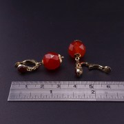 Золотые серьги с цветными камнями