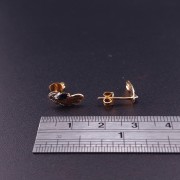 Gold earrings with colored stones