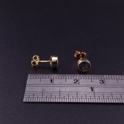 Gold earrings with colored stones