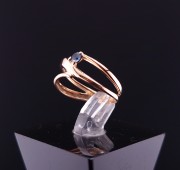 Gold ring with colored stone