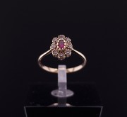 Gold ring with colored stones