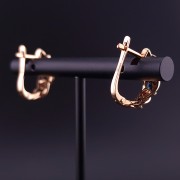 Gold earrings with diamonds and colored stones