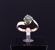 Gold ring with colored stone