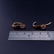 Gold earrings with zircons 
