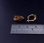 Gold earrings with zircons 
