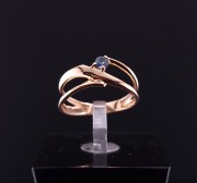 Gold ring with colored stone