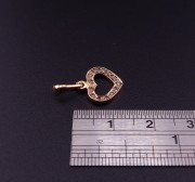 Gold pendant with zircons