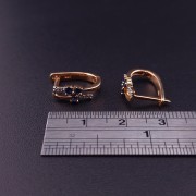 Gold earrings with diamonds and colored stones