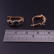 Gold earrings with diamonds and colored stones