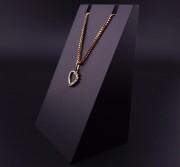 Gold pendant with zircons