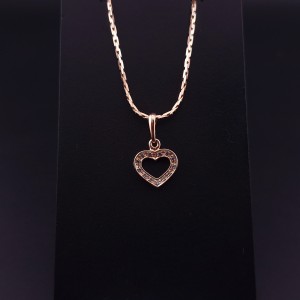 Gold pendant with zircons