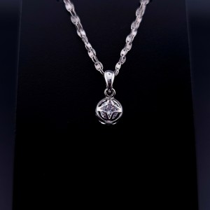 Gold pendant with zircon