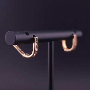 Gold earrings with zircons 