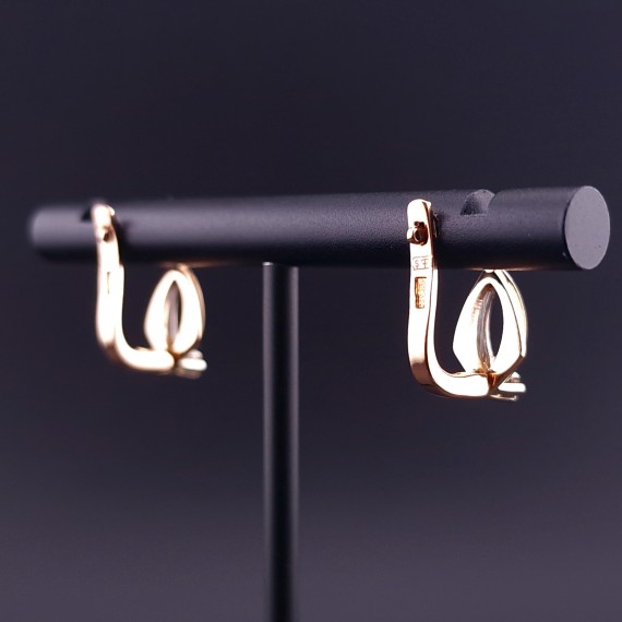 Gold earrings with zircons 