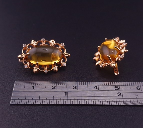 Gold earrings with citrines and fianites
