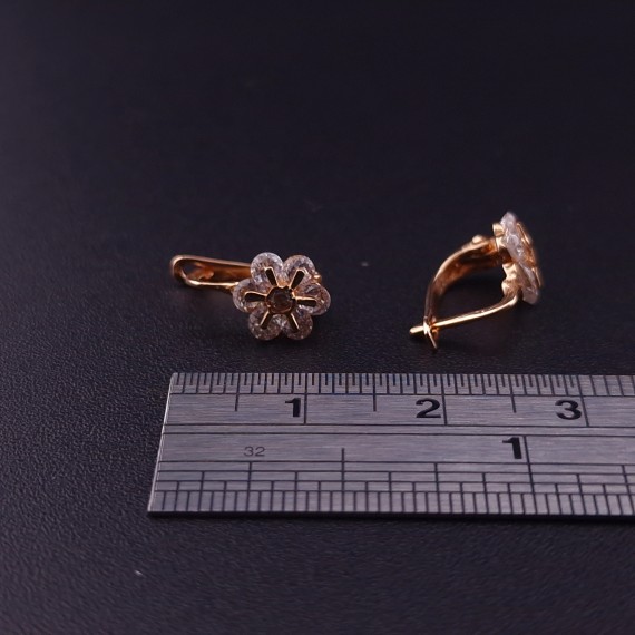 Gold earrings with zircons 