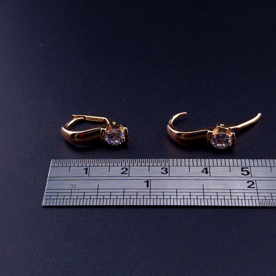 Gold earrings with zircons 