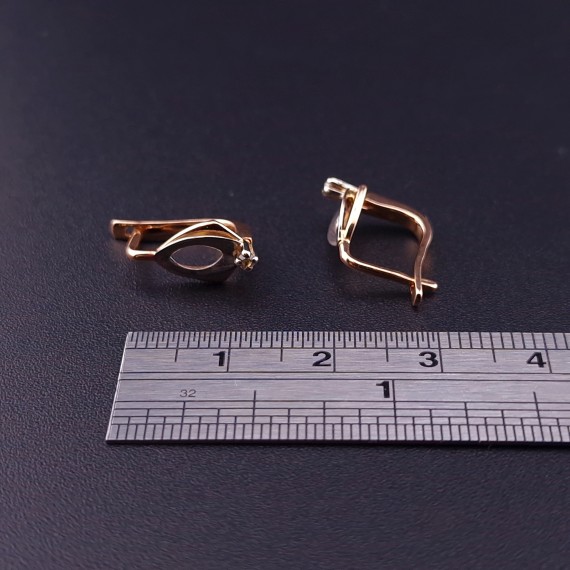 Gold earrings with zircons 