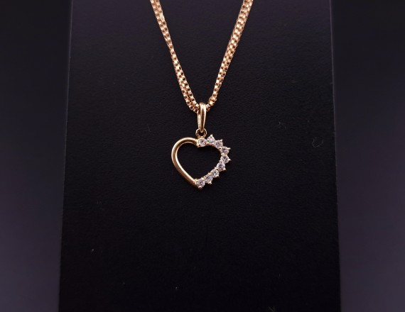 Gold pendant with zircons