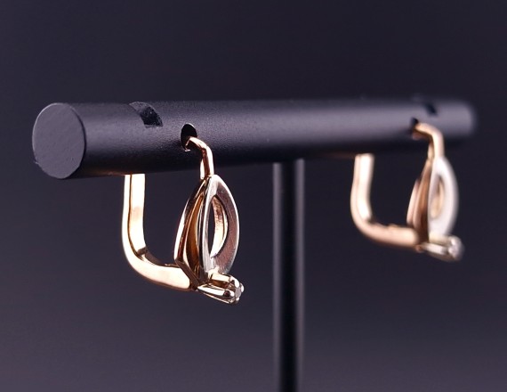 Gold earrings with zircons 