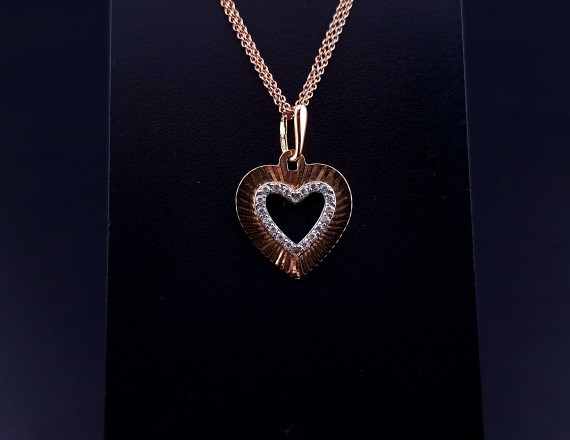 Gold pendant with zircons