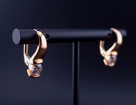 Gold earrings with zircons 