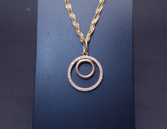Gold pendant with zircons