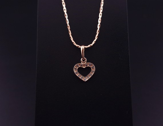 Gold pendant with zircons